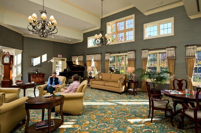 Residents socializing in a bright common area