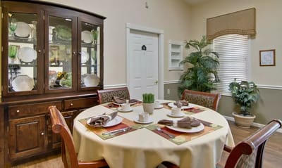 Dining area with a table set for meals