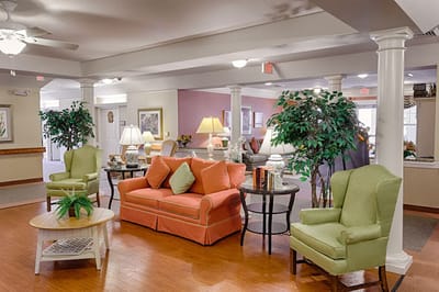 Cozy common area with comfortable seating and plants