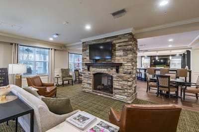 Common area with seating and a fireplace