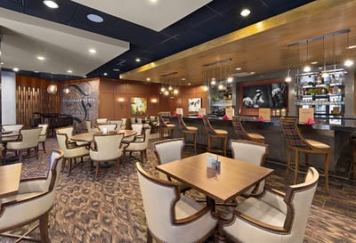 Dining area with tables and chairs in a modern interior