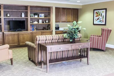 A cozy common area with seating and decor