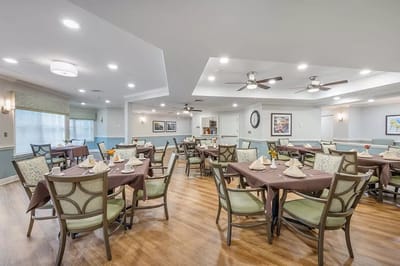 Well-decorated dining room with tables and chairs