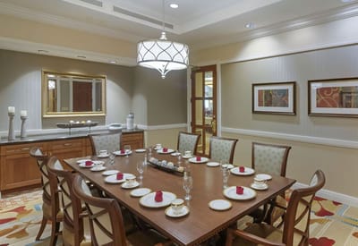 Dining room set up for a meal with elegant decor