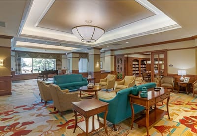 Common area with seating and bookshelves