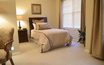 Cozy private bedroom within the assisted living facility