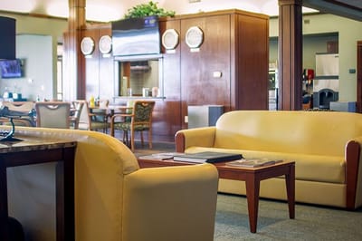 Interior view of a cozy common area with seating