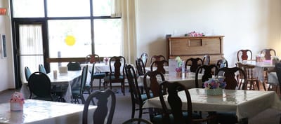 Dining area with tables and chairs in a common space