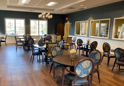 Bright dining room with tables and chairs