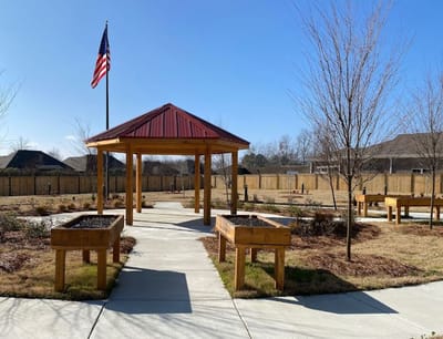 Outdoor gazebo with landscaped garden area