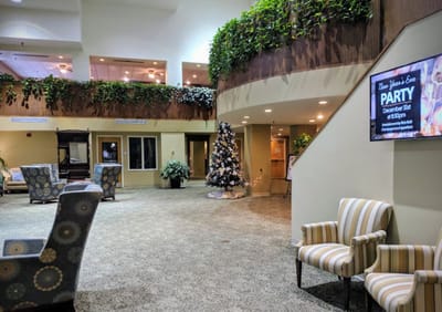 Interior view of a common area holiday party setup
