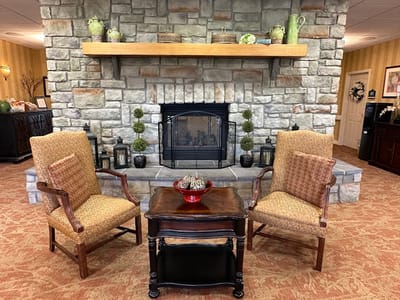 Interior seating area with a stone fireplace