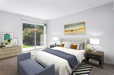 A well-decorated resident bedroom with outdoor view