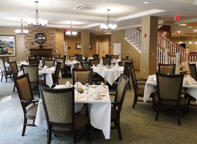 Dining area with neatly arranged tables and chairs