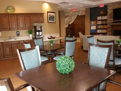 Interior view of a dining room with tables and chairs