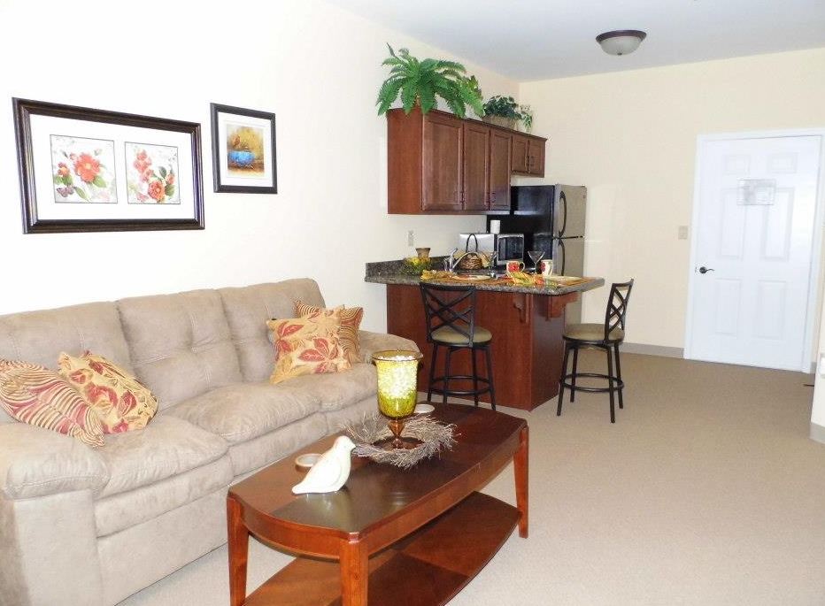 Cozy indoor living space with kitchen and seating area