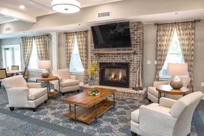 Cozy common area with seating and a fireplace