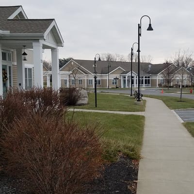 Pathway in an assisted living facility with outdoor lighting