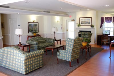 Interior view of a common area with chairs and tables