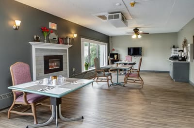 Dining area with tables and chairs in a common space