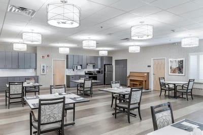 Bright dining area with tables and chairs
