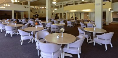 Bright dining area set up for residents
