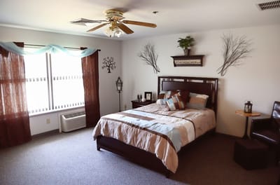 Cozy resident room with bed and decor