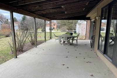 Covered outdoor space with tables and chairs