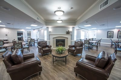 Common area with comfortable seating and a fireplace
