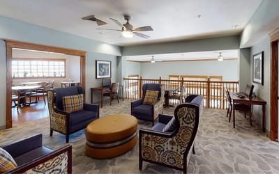 Bright common area with comfortable seating and decor