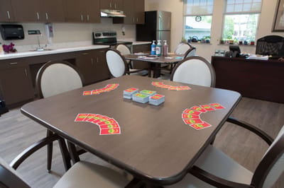 Card game setup in a common area of the facility