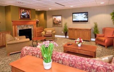 Common area with seating and a fireplace