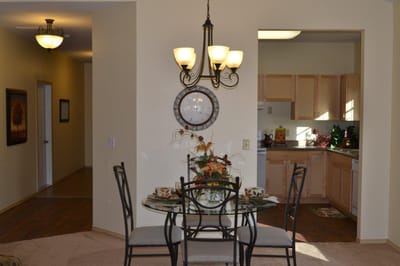 Inviting dining area with a table and kitchen view