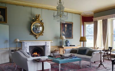 Elegant common area with a fireplace and artwork
