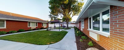 Well-maintained outdoor space with gazebo and greenery