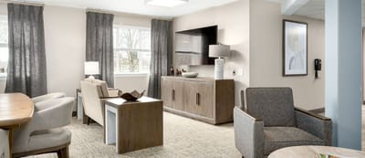 A cozy and modern living room area in the facility