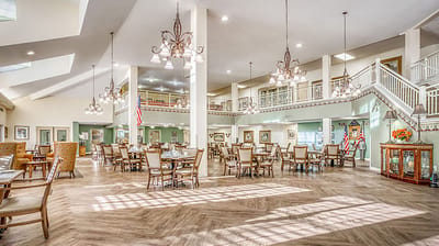 Bright dining room with arranged tables and chairs