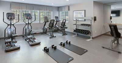 Interior view of a fitness room with exercise equipment