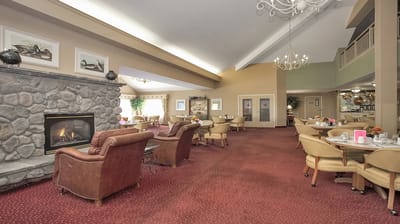 Brightly lit dining room with elegant furniture
