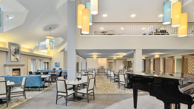 Bright dining room with tables and chairs