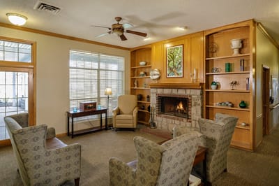 Cozy common area with seating and a fireplace