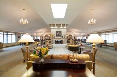 Interior view of a bright common area with seating
