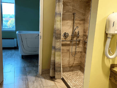 Accessible bathroom with shower and tub facilities