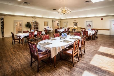 Elegant dining room with tables and chairs set up