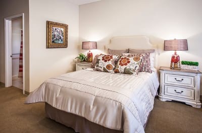 Brightly decorated resident bedroom with bohemian accents