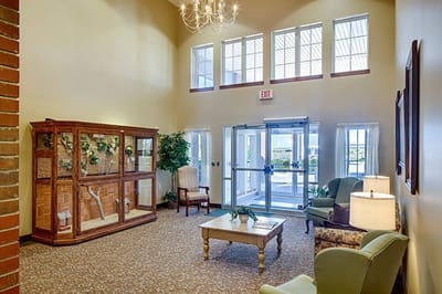Lobby area with seating and natural light