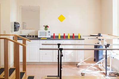 Interior therapy space with equipment and a kitchenette
