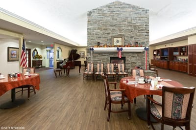 Cozy common area with seating and a fireplace