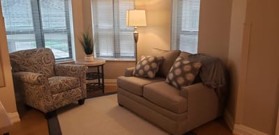 Cozy sitting area with a couch and chair