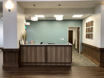 Welcome area with reception desk in a senior living facility